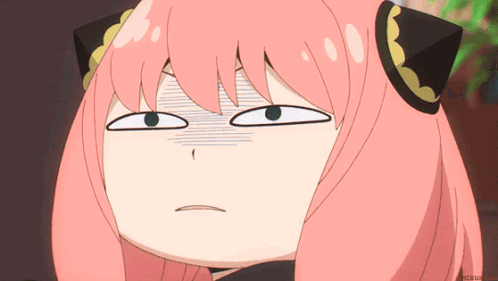 Anya Forger gives a flat, displeased stare.