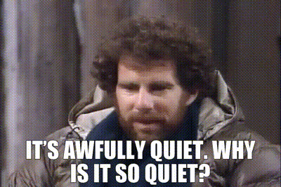 A bundled-up man asks, “IT'S AWFULLY QUIET. WHY IS IT SO QUIET?”