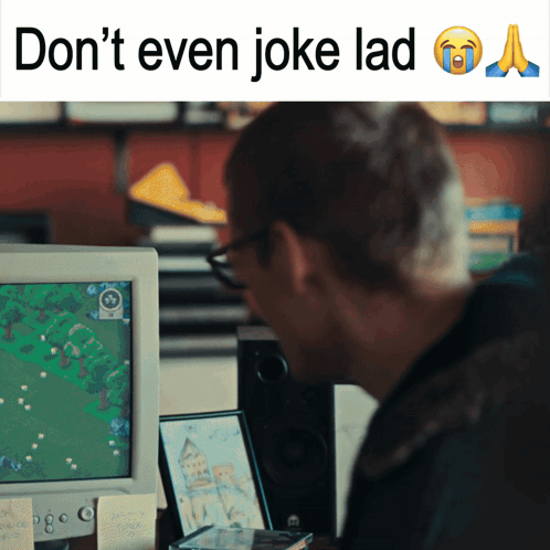 a man sitting in front of a computer screen with the words " do n't even joke lad " below him