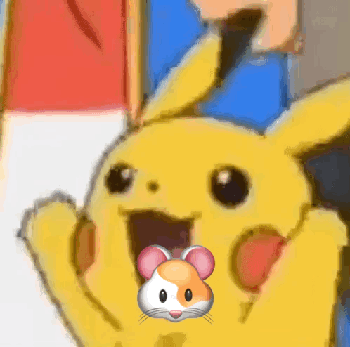 a close up of a pikachu with a mouse in its mouth