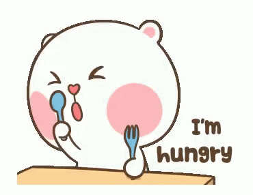A round white bear eats from a table, saying “I’m hungry.”