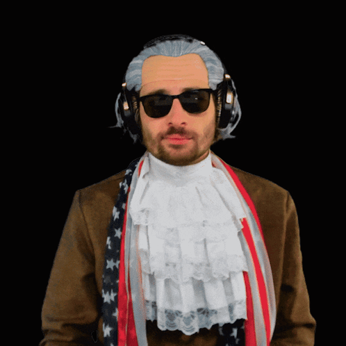 a man wearing a wig and sunglasses has headphones on his head