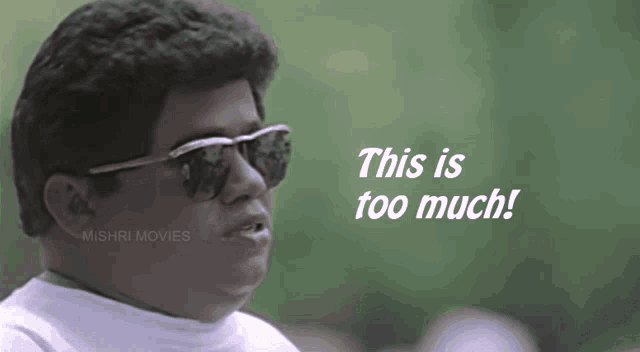 a man wearing sunglasses says " this is too much " in white letters
